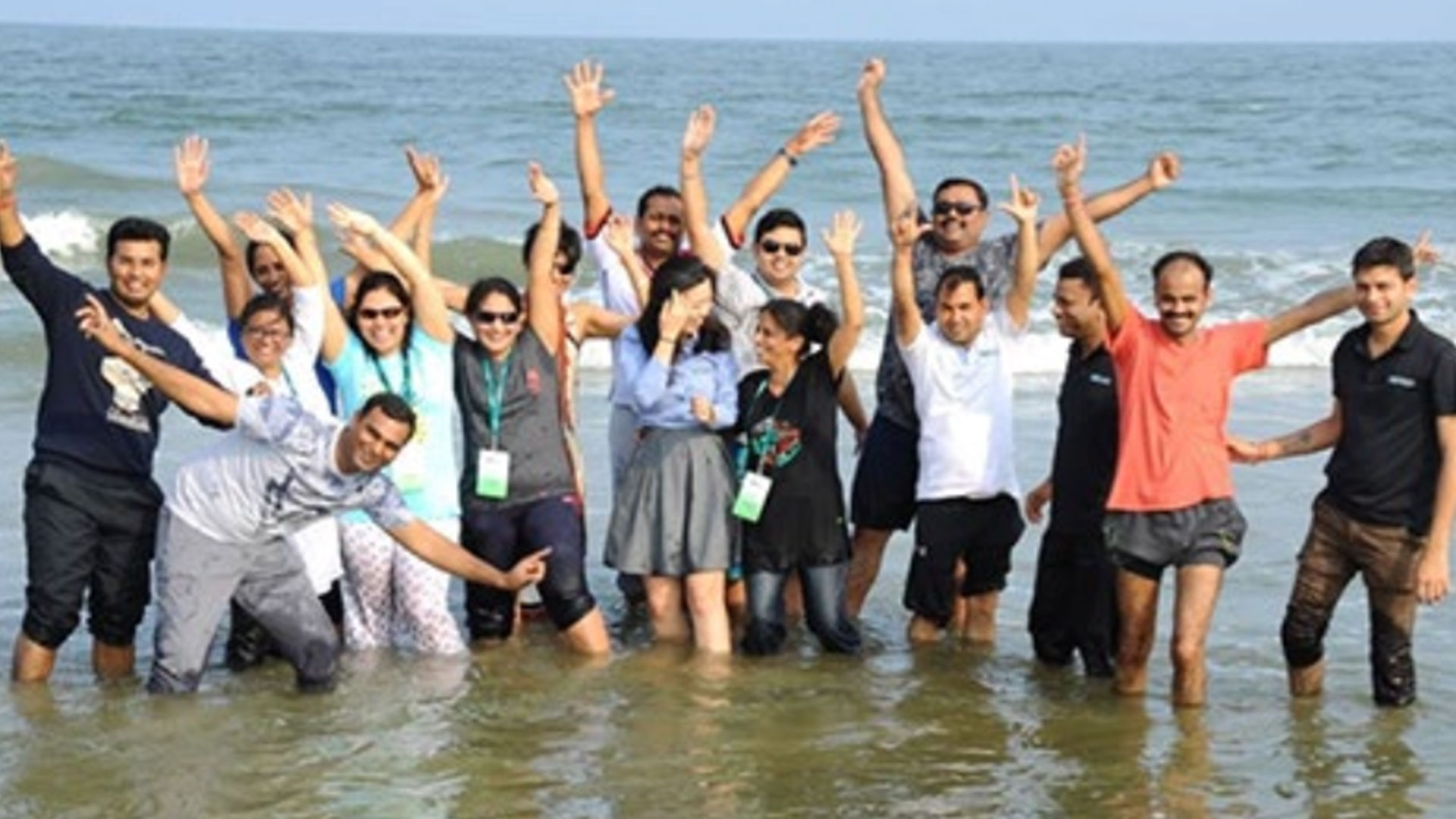 Convergint employees in the ocean