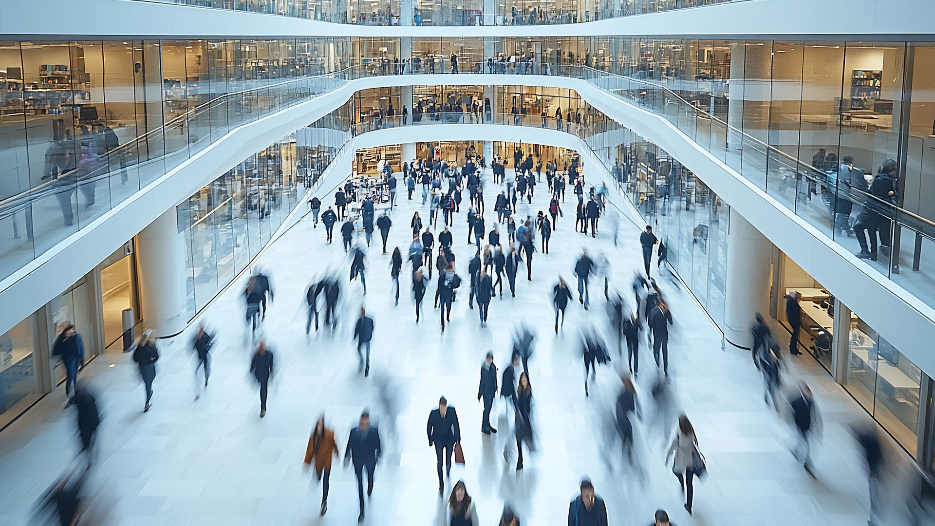 Corporate building full of people blurred