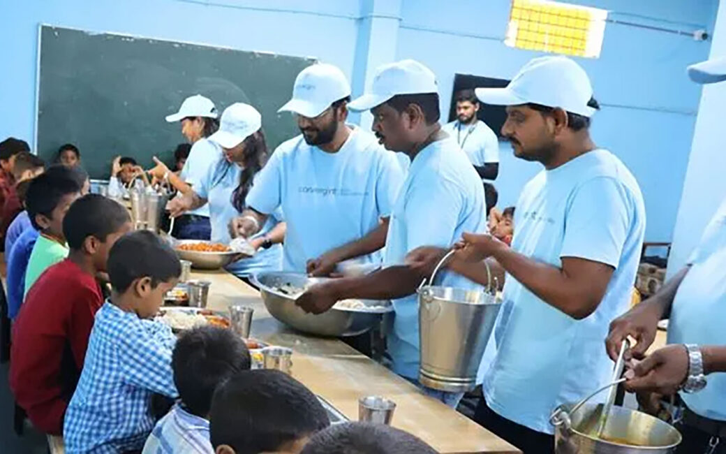 Convergint’s India team feeding children at school