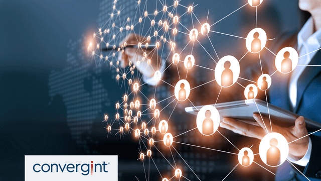 Businessman holding a tablet and pen connecting circular icons that represent people